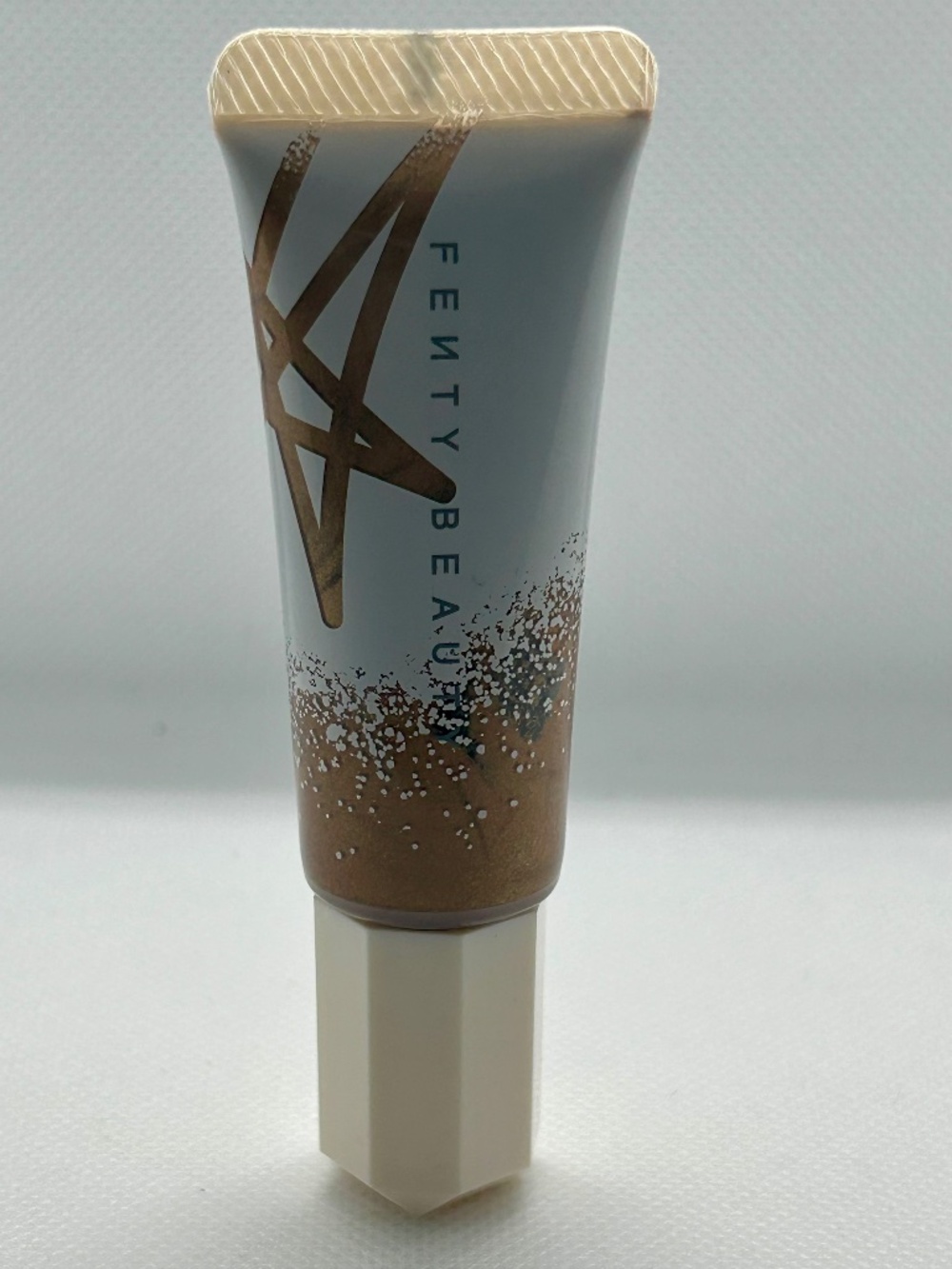Fenty Beauty - Liquid Killawatt - Fluid Highlighter - Butta Brownie